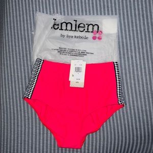 Brand is Lemlem by Liya Kebede. Color is hot coral. The size is Small.